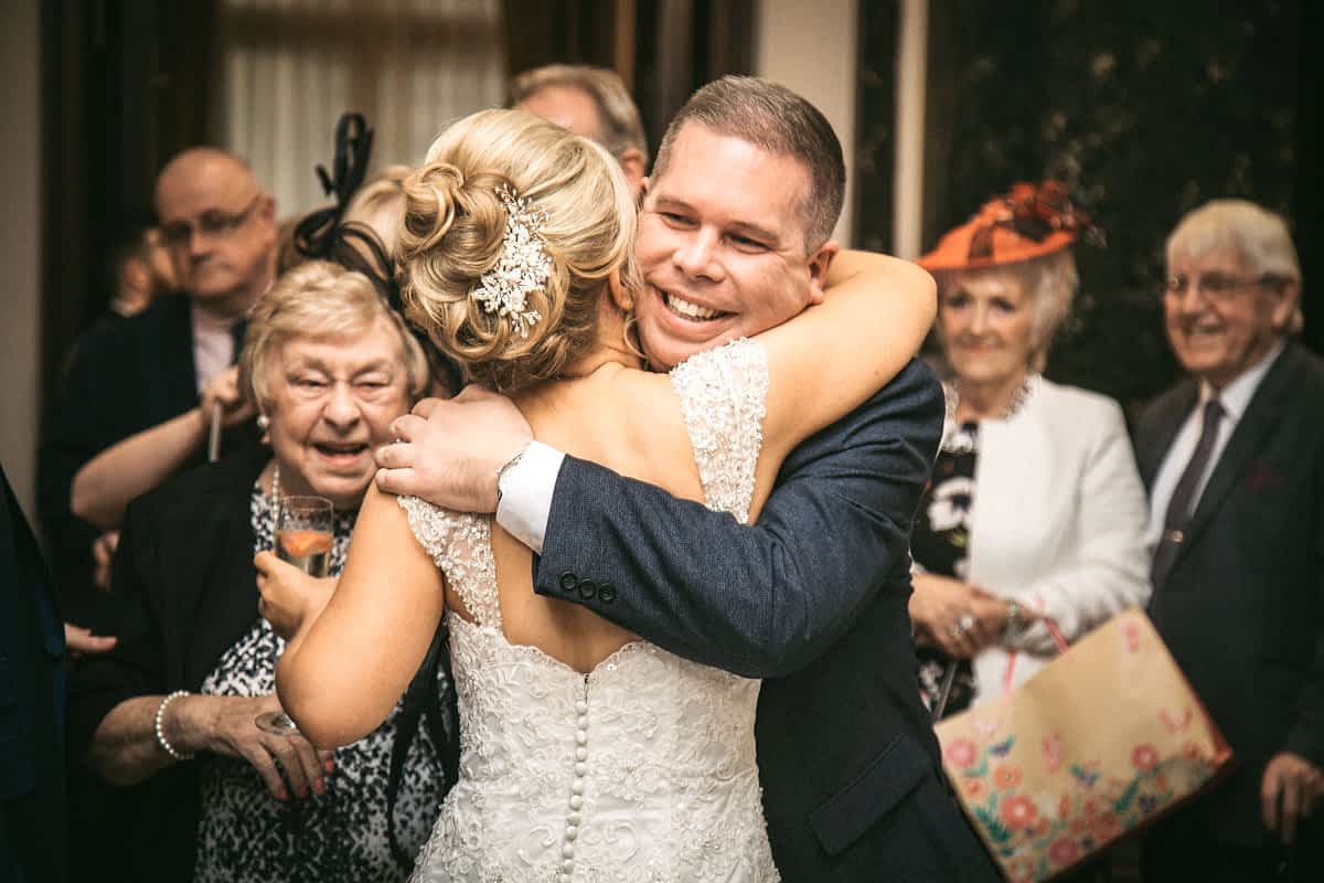 hugging guests