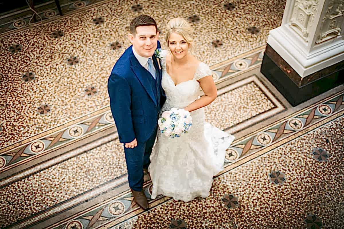 bride and groom smiling