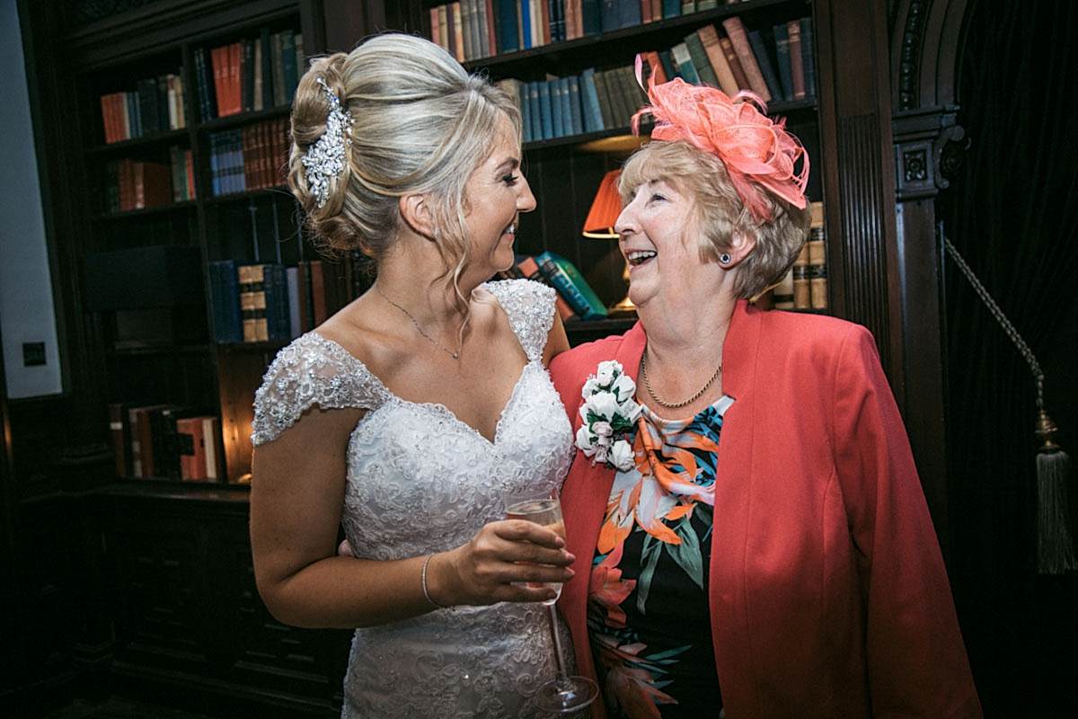 bride and her mum laughing