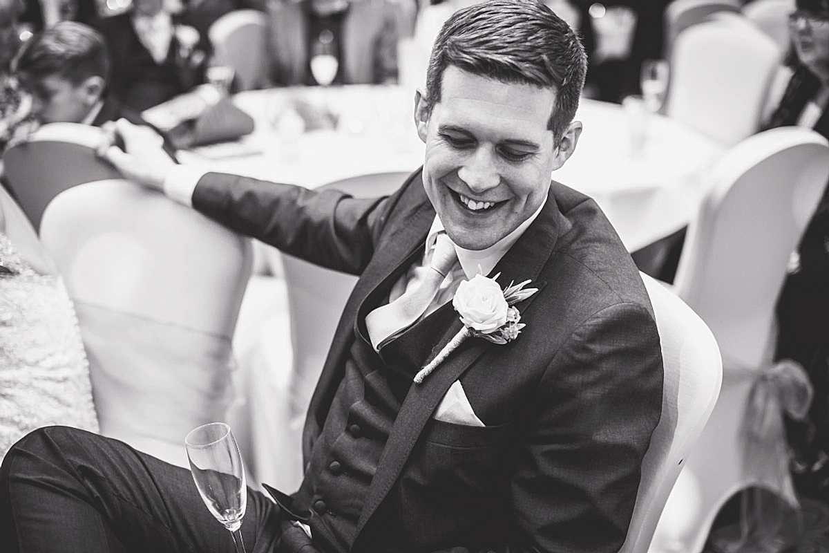 groom in black and white 