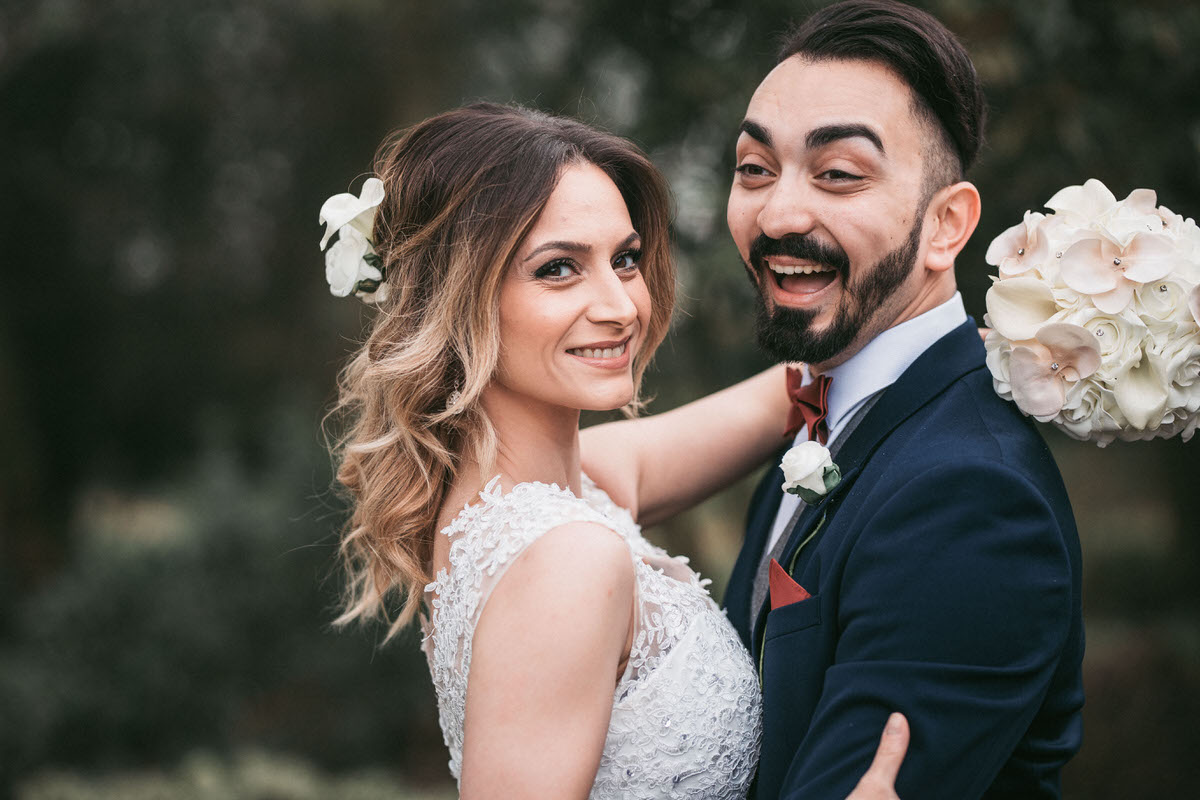 bride and couple laughing outside at ashfield house