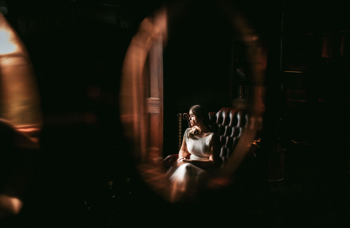 bride's reflection in bar taken by liverpool wedding photographer at ashfield house