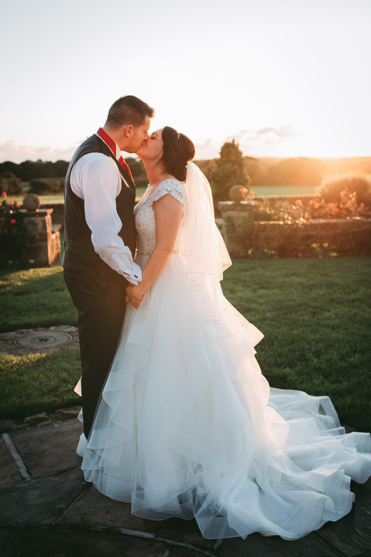 golden hour couple portraits with the most amazing wedding dress at beeston manor